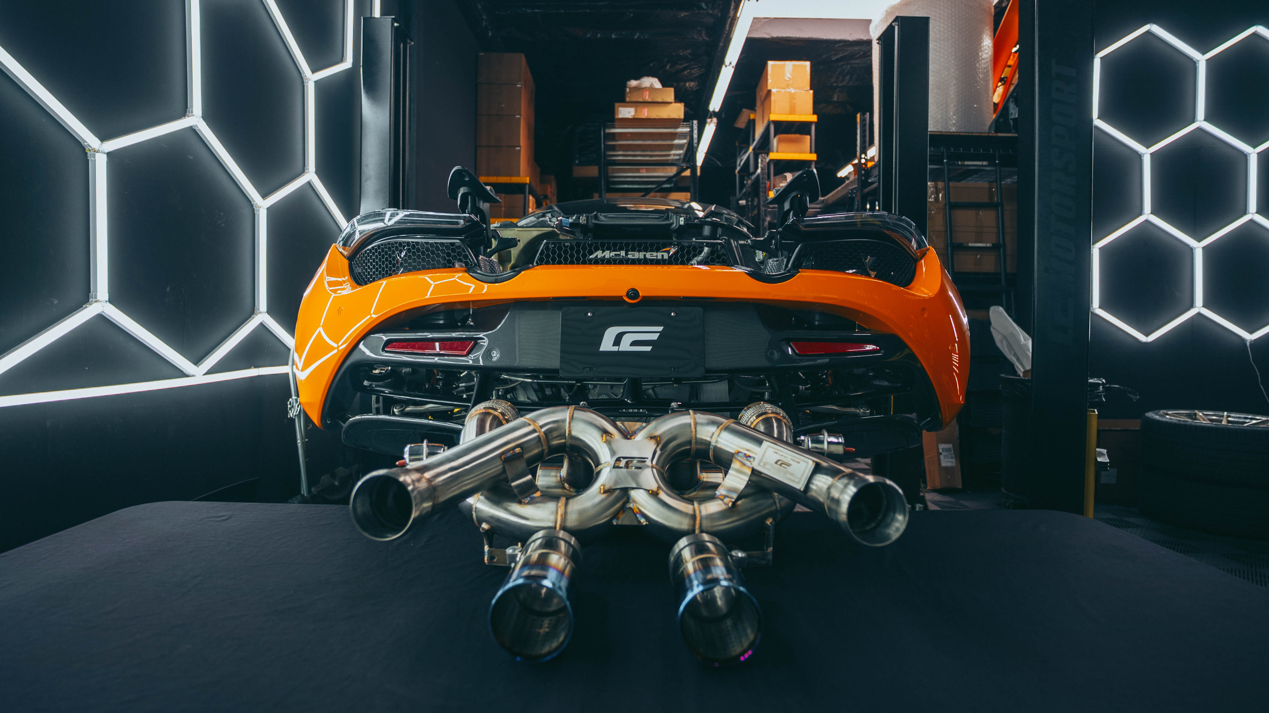 McLaren 720S exhaust hand TIG-welded joints showing precision craftsmanship