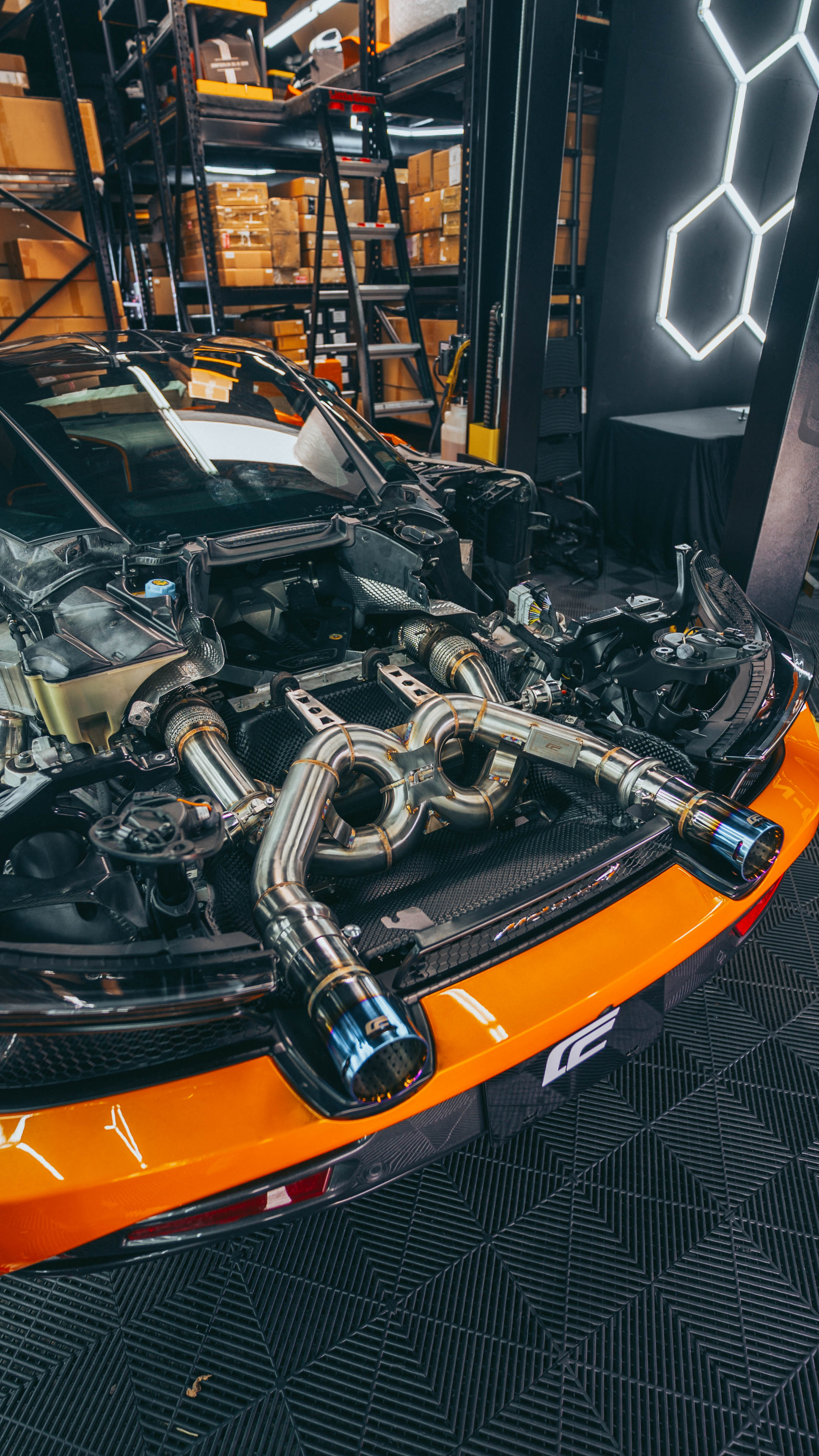 McLaren 720S exhaust system component detail showing weld quality