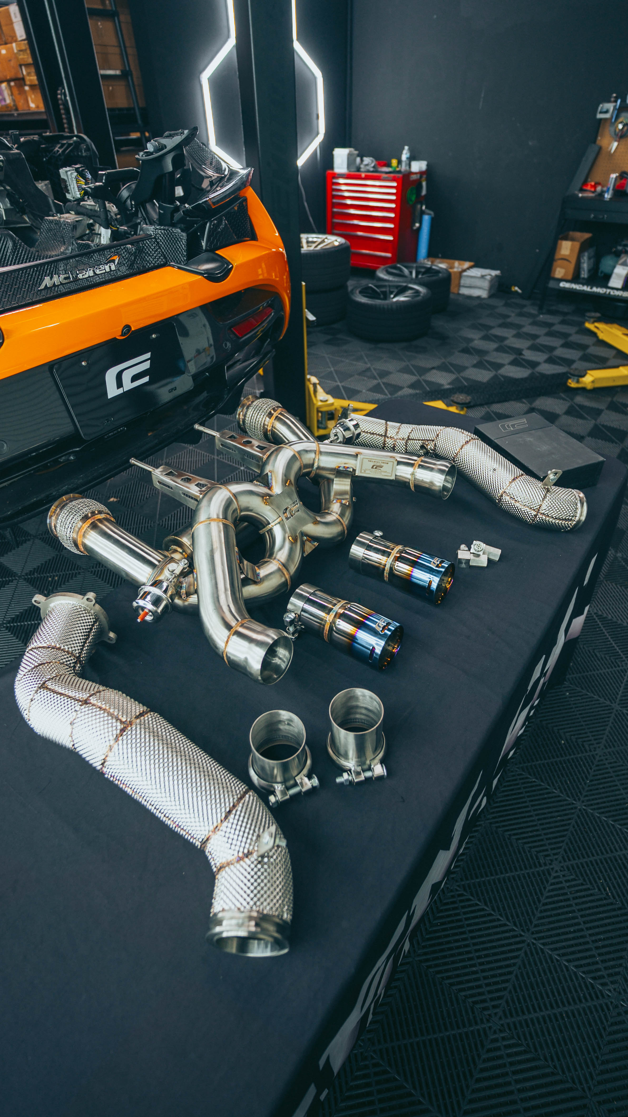 McLaren 720S exhaust mandrel-bent tubing with rainbow TIG welds