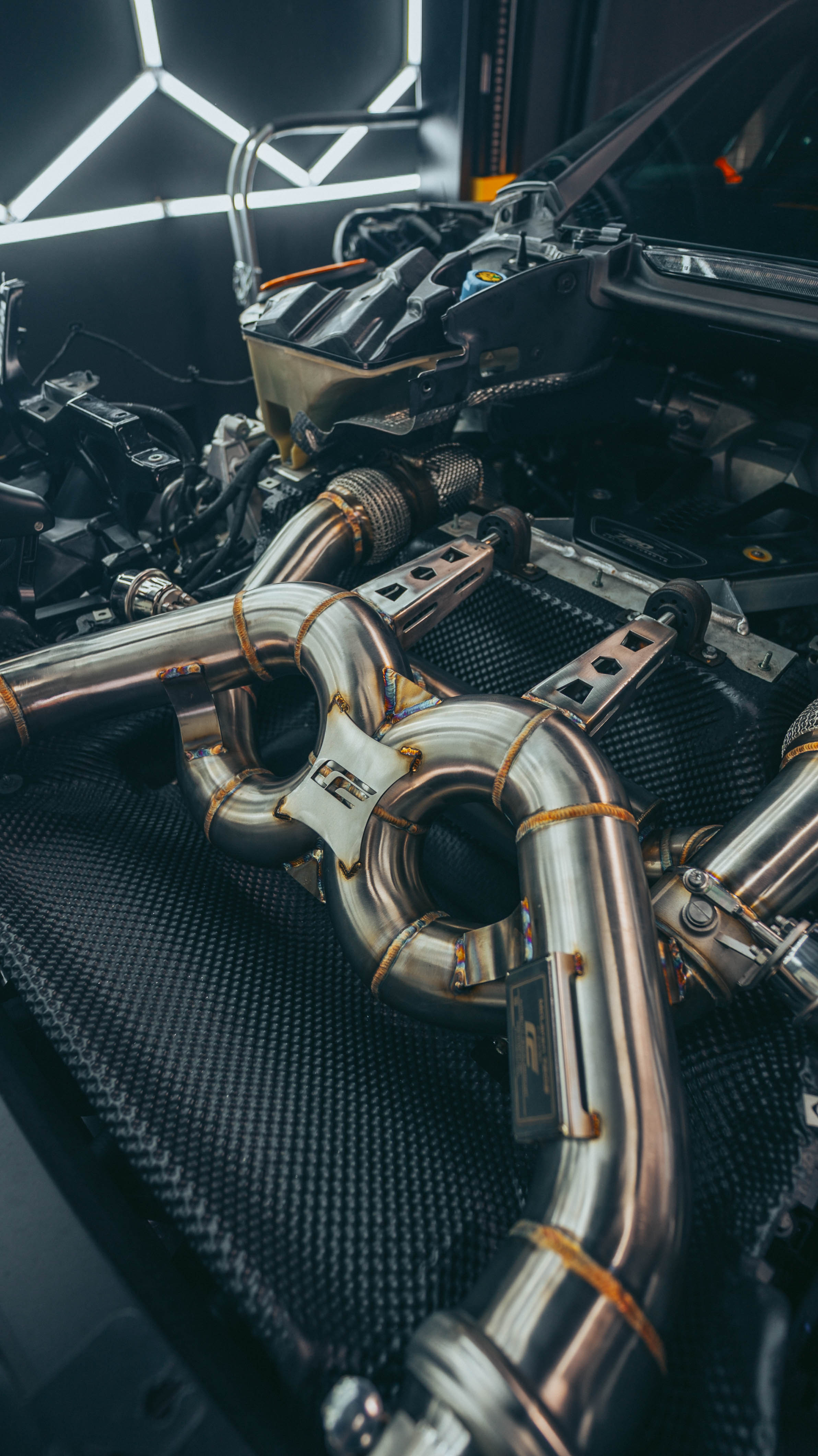 McLaren 720S exhaust final installation showing professional quality