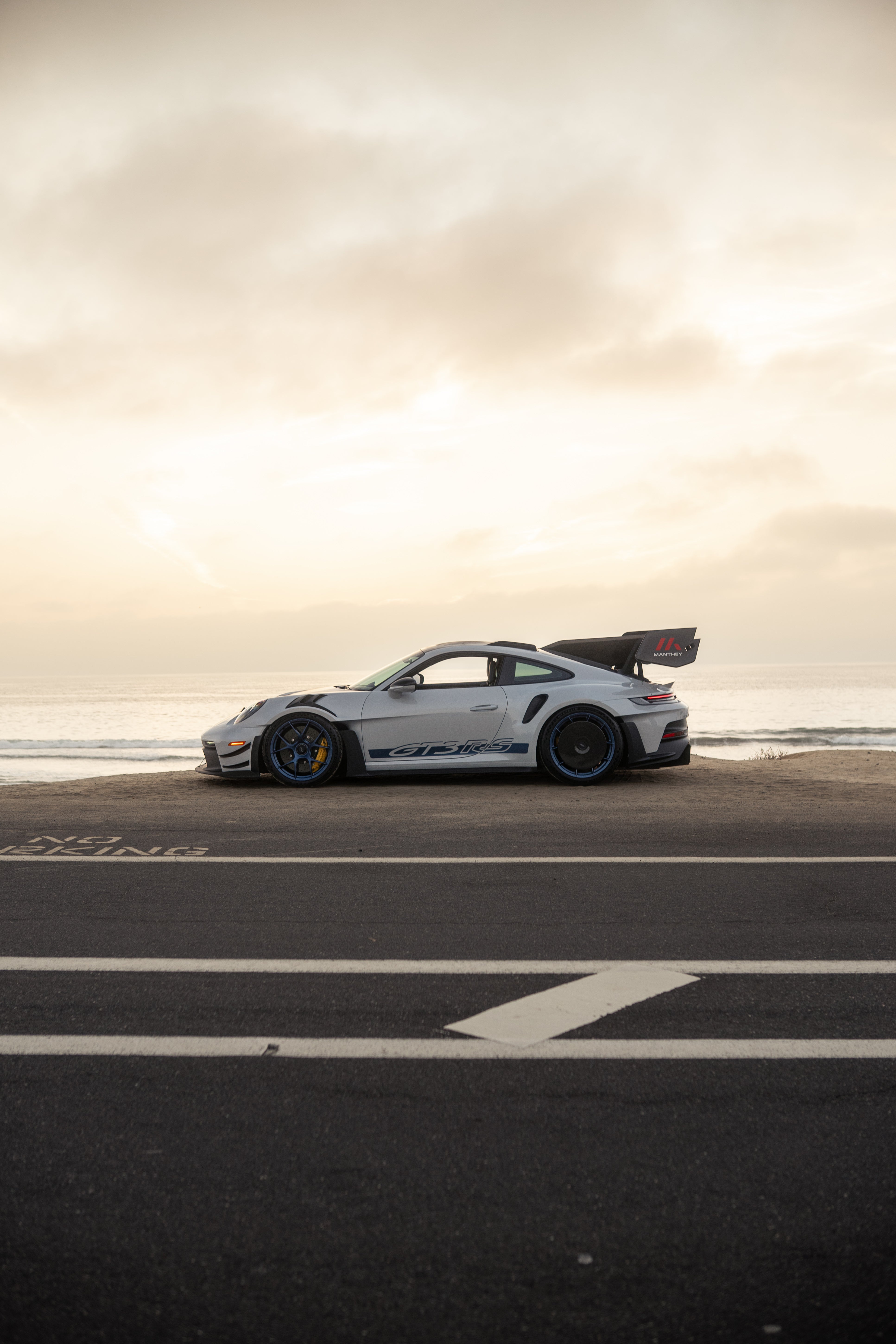 Manthey 992 GT3 RS side profile beach