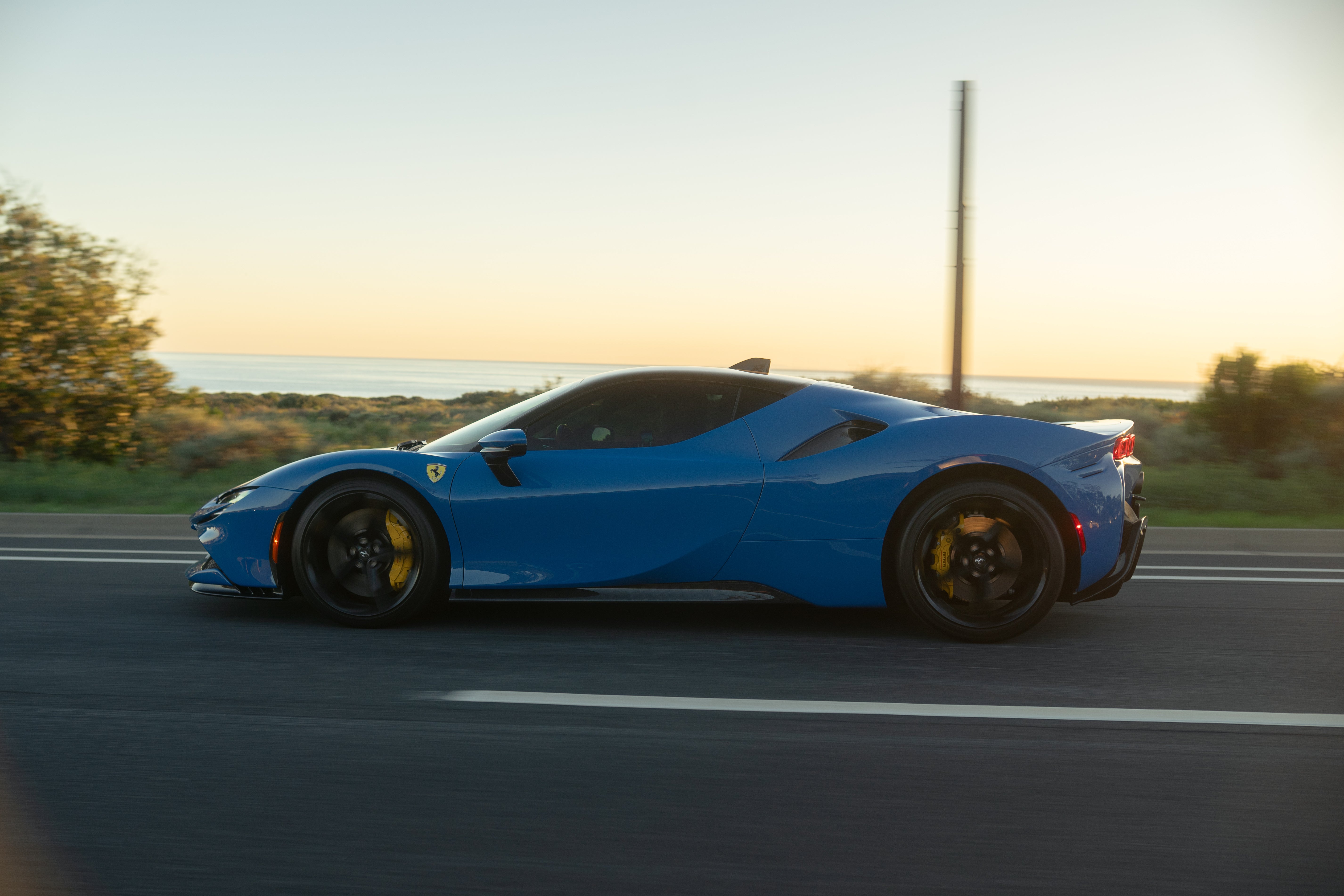 Blue Ferrari SF90 Stradale coastal California